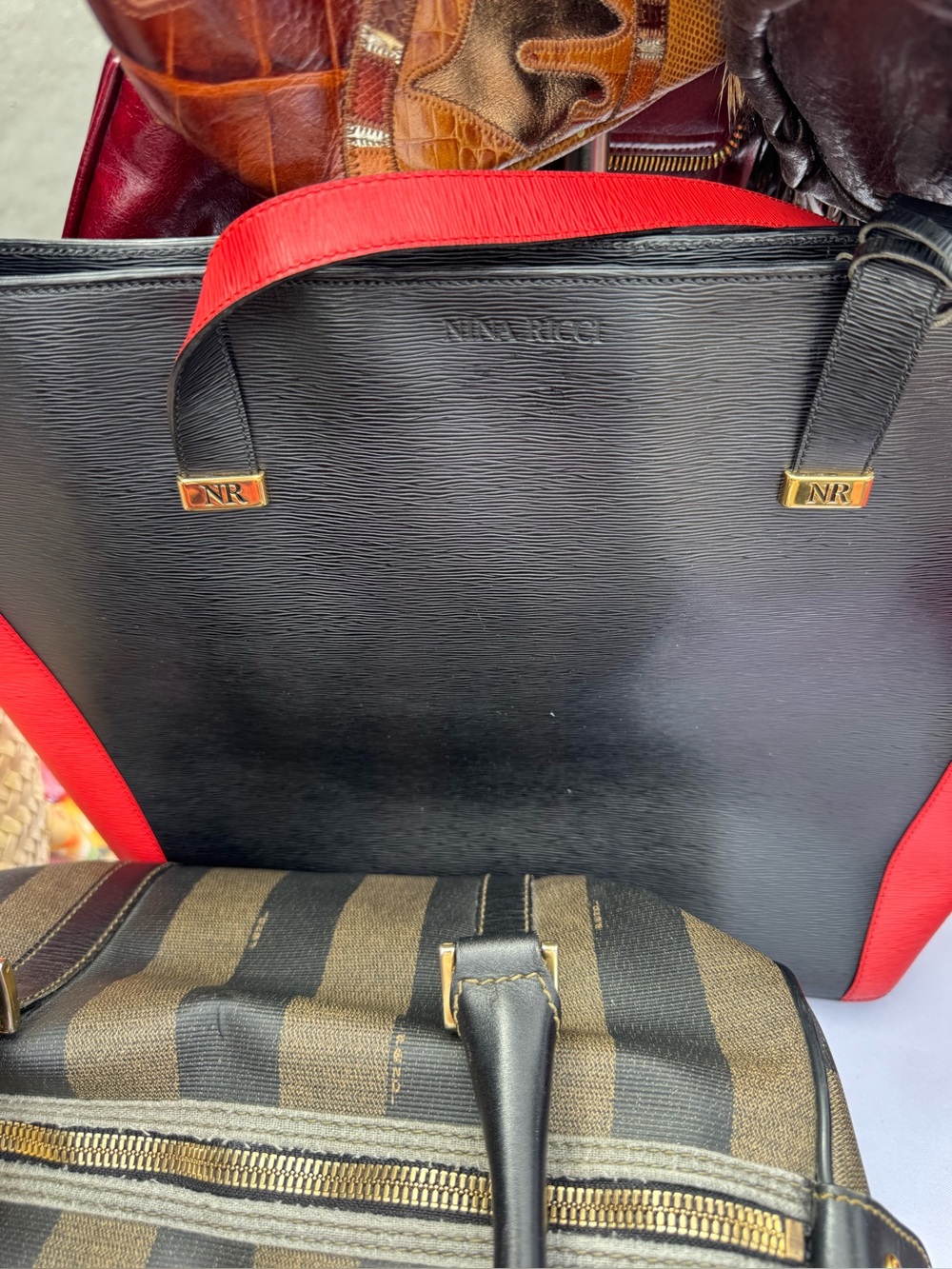 Nina Ricci Black and Red Leather Tote with Gold Accents